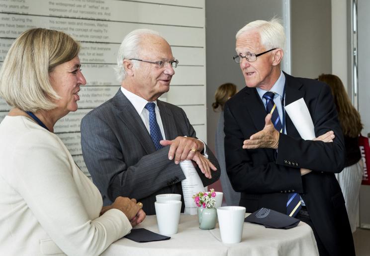 Carl XVI Gustaf King of Sweden talks to the Chair of the SIPRI Governing Board, Sven Olof-Petersson