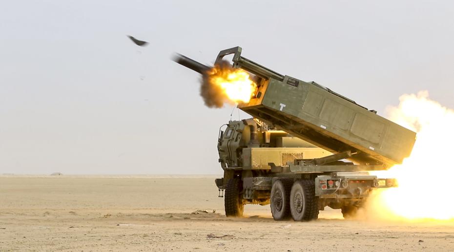 US soldiers fire a High Mobility Artillery Rocket System (HIMARS) during a joint live-fire exercise with the Kuwait Land Forces.