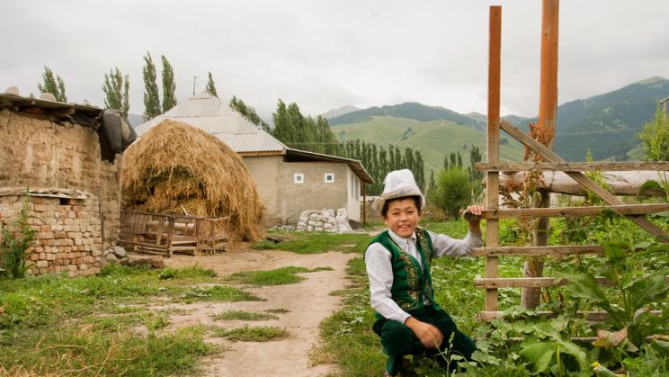 A young boy wears a traditional Kyrgyz hat in Kemin, Kyrgyzstan, 2013