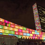 Sustianable Development Goals projected onto the UN headquarters building, 2015.