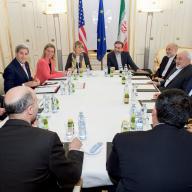 US and EU officials met with their Iranian counterparts during Iran nuclear negotiations, 13 July 2015