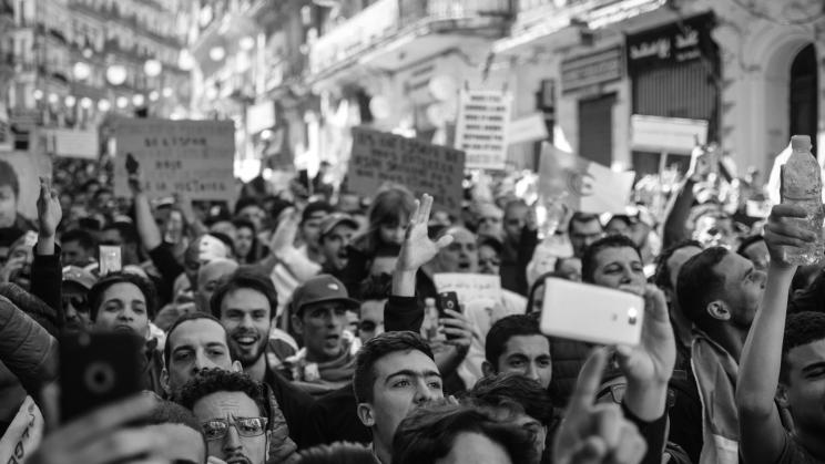 Protestors march in Algeria. Credit: Amine M'siouri/Pexels.